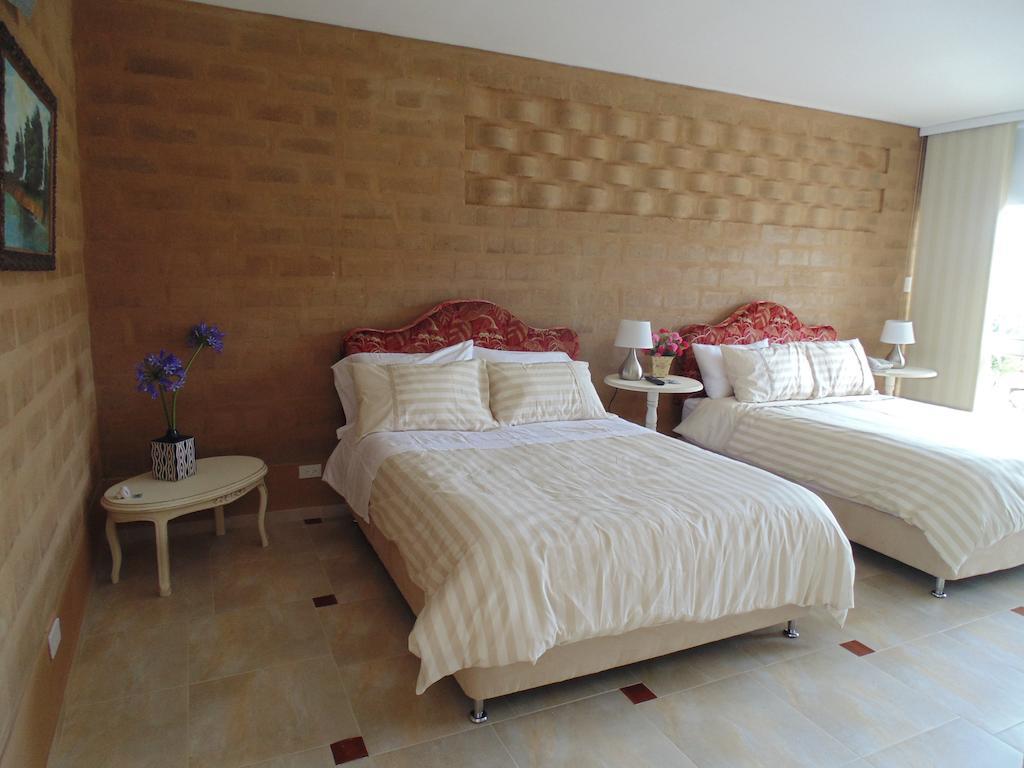 Bella Tierra Hotel Boutique Tibasosa Habitación foto