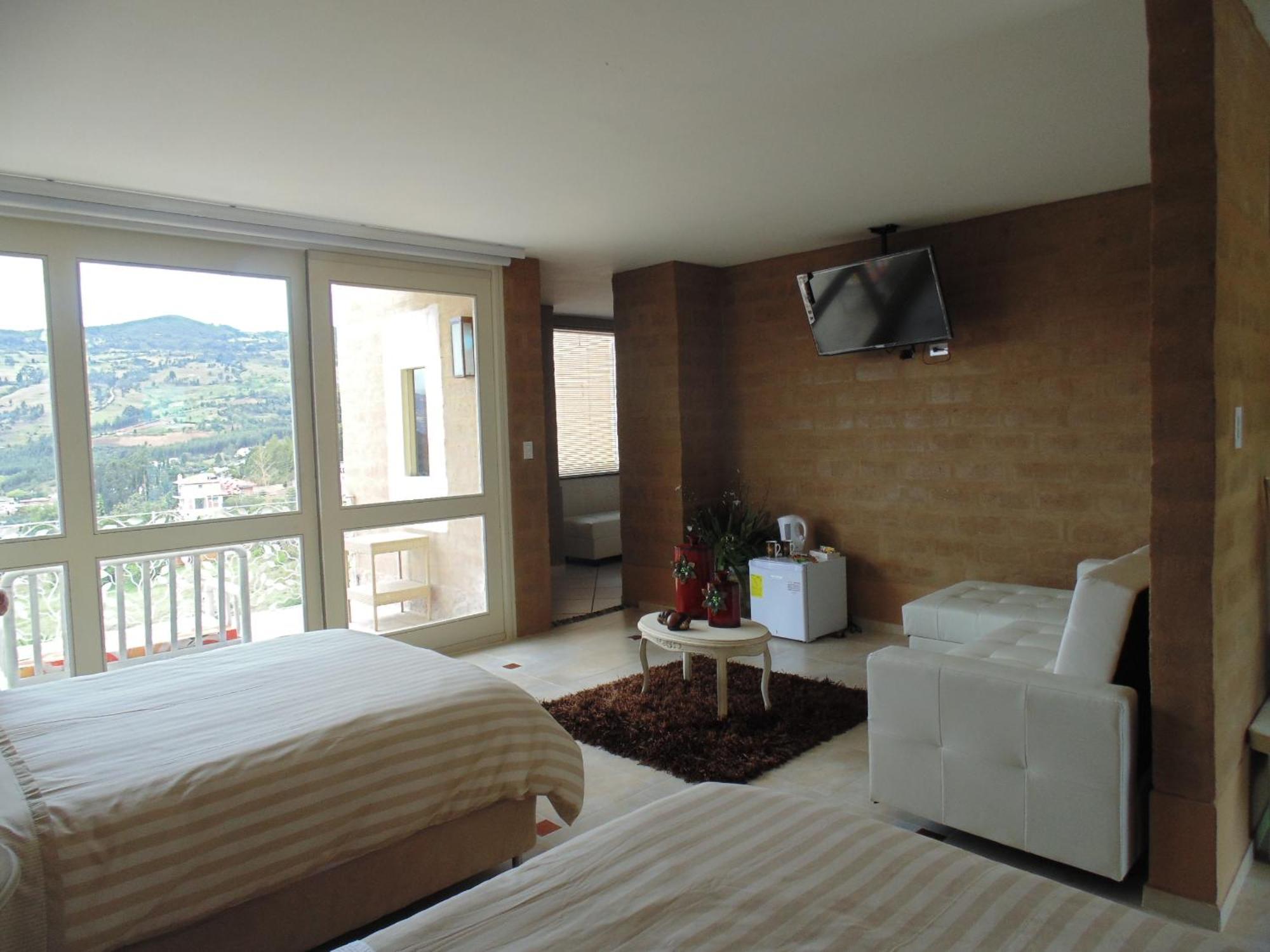 Bella Tierra Hotel Boutique Tibasosa Habitación foto