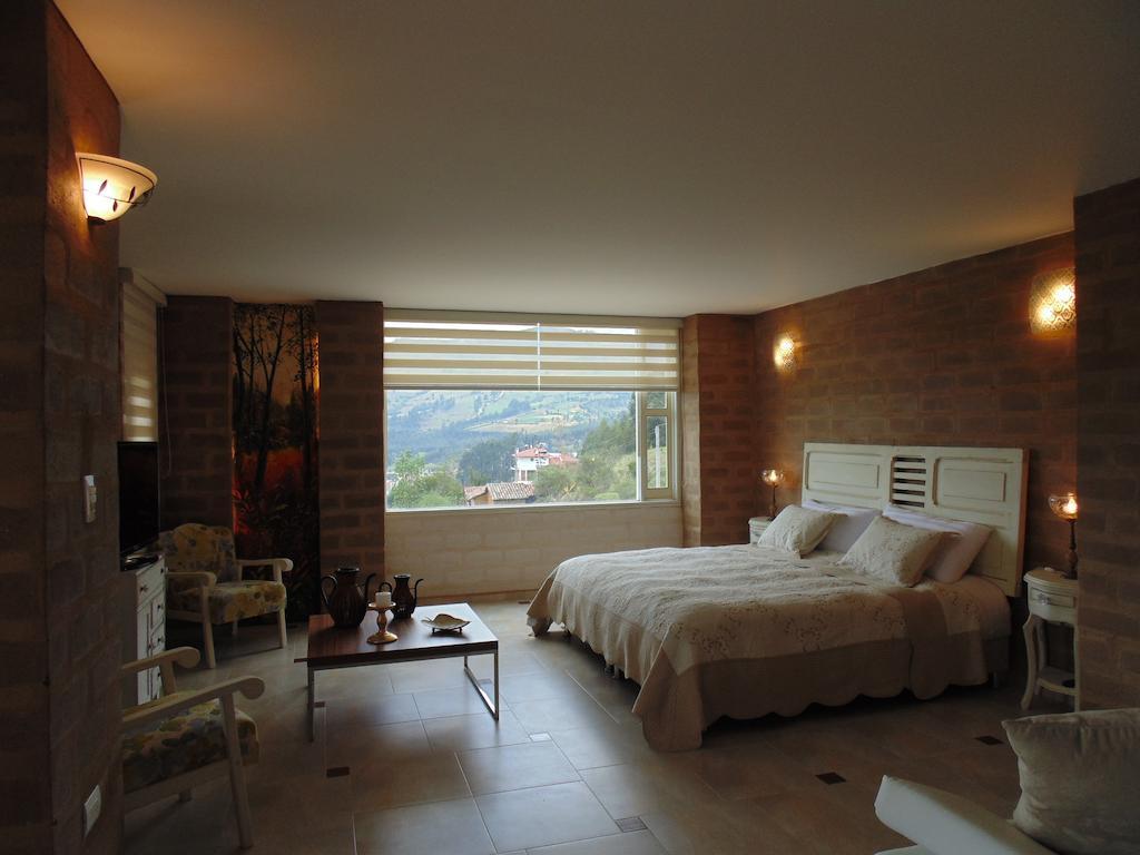 Bella Tierra Hotel Boutique Tibasosa Habitación foto